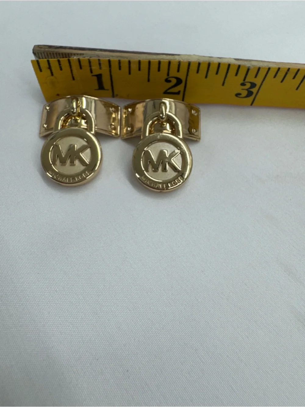 Michael Kors hardware shown
